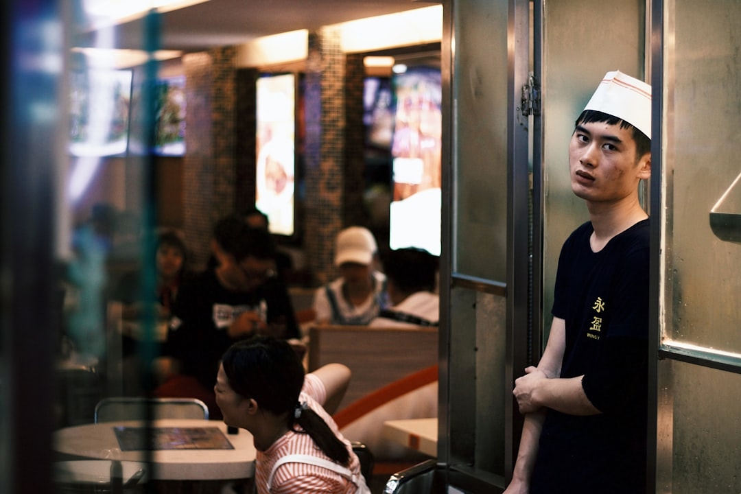 Restaurant staff following a service routine guide during shift.